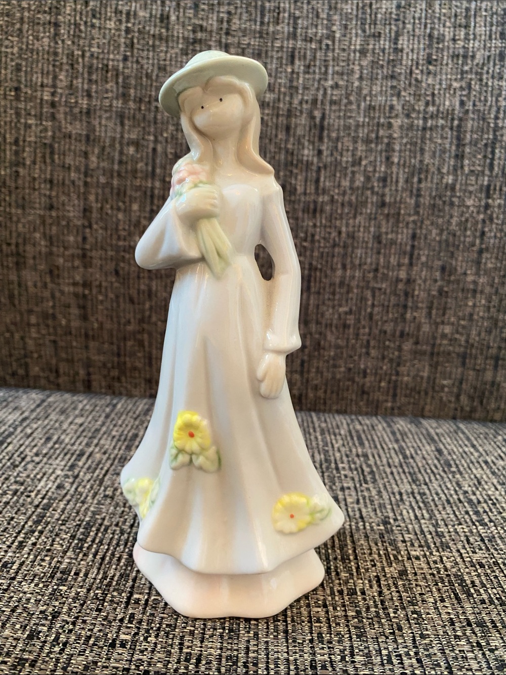 White Ceramic Lady Figurine with Soft Yellow Flower Accents